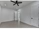 Minimalist bedroom with durable flooring, recessed lighting, and all white walls at 165 Westbrook St, Buford, GA 30518