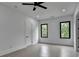This airy bedroom is well-lit with natural light and features sleek, modern design at 165 Westbrook St, Buford, GA 30518
