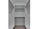 Spacious walk-in closet with custom shelving and ample storage space at 165 Westbrook St, Buford, GA 30518