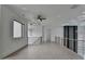 Second story hallway with modern railing, recessed lighting, and large window at 165 Westbrook St, Buford, GA 30518