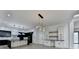 Modern kitchen features a large island with sleek countertops and state-of-the-art appliances at 165 Westbrook St, Buford, GA 30518