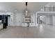 Bright, open-concept space with modern fixtures and a view to the upper level at 165 Westbrook St, Buford, GA 30518