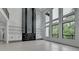 Bright and open floorplan with a grand fireplace and large windows at 165 Westbrook St, Buford, GA 30518