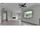 Living room with ceiling fan and fireplace at 165 Westbrook St, Buford, GA 30518
