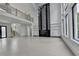 Bright and open living space with large windows and a modern fireplace at 165 Westbrook St, Buford, GA 30518