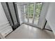 Bright living room with modern lighting, fireplace, and a great view through large windows at 165 Westbrook St, Buford, GA 30518