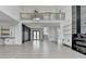 Bright, open living space with fireplace and staircase at 165 Westbrook St, Buford, GA 30518