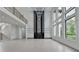 Open living space with high ceilings, modern lighting and fireplace at 165 Westbrook St, Buford, GA 30518