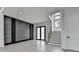 Bright living room featuring hardwood floors and stylish staircase at 165 Westbrook St, Buford, GA 30518