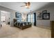 Relaxing bedroom with a comfortable bed, blue accents, and natural light at 3013 Walker Hill Way, Marietta, GA 30064