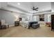 Main bedroom with tray ceilings and built-in cabinets with TV at 3013 Walker Hill Way, Marietta, GA 30064