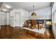 Charming dining area features custom lighting and a cozy banquette seating at 3013 Walker Hill Way, Marietta, GA 30064