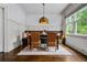 Dining room with a custom pendant light fixture and dark wood flooring at 3013 Walker Hill Way, Marietta, GA 30064
