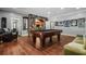 Entertaining game room with a pool table, bar access, and stone archway, great for gatherings at 3013 Walker Hill Way, Marietta, GA 30064