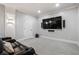 Modern home theater featuring a large screen, wall speakers, and comfortable seating for an immersive experience at 3013 Walker Hill Way, Marietta, GA 30064