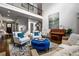 Open-concept living room with high ceilings, hardwood floors, and abundant natural light at 3013 Walker Hill Way, Marietta, GA 30064