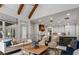 Open-concept living space connecting to the kitchen, featuring modern décor and ample lighting at 3013 Walker Hill Way, Marietta, GA 30064