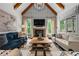 Comfortable living room with vaulted ceilings, patterned wallpaper, and large windows at 3013 Walker Hill Way, Marietta, GA 30064