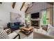 Cozy living room featuring fireplace, patterned wallpaper, and comfortable seating at 3013 Walker Hill Way, Marietta, GA 30064