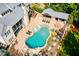 Aerial view of a backyard with a large pool, outdoor kitchen, and patio area at 3013 Walker Hill Way, Marietta, GA 30064
