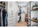 Spacious walk-in closet with custom shelving, drawers, and ample storage space at 3013 Walker Hill Way, Marietta, GA 30064