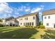 Home with a manicured lawn and well-maintained shrubbery at 3380 Labrouste Cv, Duluth, GA 30097