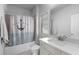 Bathroom with marble countertop, bathtub, toilet, and shower at 3380 Labrouste Cv, Duluth, GA 30097