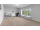 Spacious bedroom with neutral colors, closet, and office area at 3380 Labrouste Cv, Duluth, GA 30097