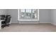 Bedroom with carpet, large window and desk at 3380 Labrouste Cv, Duluth, GA 30097