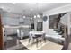 Open-concept kitchen features an island and stainless steel appliances at 3380 Labrouste Cv, Duluth, GA 30097