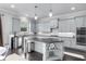 Bright kitchen with island and stainless appliances, a delightful space for cooking at 3380 Labrouste Cv, Duluth, GA 30097