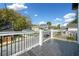 Tiled balcony with black metal railings overlooking the surrounding neighborhood on a clear day at 962 Welch Sw St, Atlanta, GA 30310