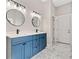 Bathroom featuring double sink vanity, modern fixtures, and bright lighting at 962 Welch Sw St, Atlanta, GA 30310