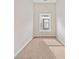 Neutral carpeted bedroom with white trim and one window at 962 Welch Sw St, Atlanta, GA 30310