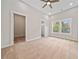 Spacious bedroom featuring plush carpeting, neutral paint, and large bright windows at 962 Welch Sw St, Atlanta, GA 30310