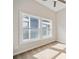 Carpeted bedroom with high ceilings and large windows at 962 Welch Sw St, Atlanta, GA 30310