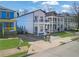 Exterior view of a new construction two-story home with front porch and balcony at 962 Welch Sw St, Atlanta, GA 30310