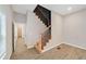 Light-filled interior with modern staircase and open layout, perfect for entertaining at 962 Welch Sw St, Atlanta, GA 30310
