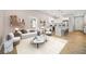 Bright and airy living room showcases a kitchen, dining area, and comfortable seating at 962 Welch Sw St, Atlanta, GA 30310