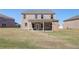 Backyard with a covered patio area at 228 Chiswick Loop, Stockbridge, GA 30281