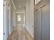 Inviting entryway features hardwood floors and a view of the living area at 228 Chiswick Loop, Stockbridge, GA 30281