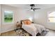 Cozy bedroom with hardwood floors, neutral tones, and ample natural light at 286 Booker Sw St, Atlanta, GA 30315
