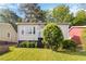 Charming single-story home with a well-maintained lawn and mature landscaping at 286 Booker Sw St, Atlanta, GA 30315