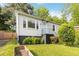 Quaint one-story house featuring a well-manicured lawn, front garden, and charming details at 286 Booker Sw St, Atlanta, GA 30315
