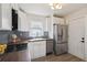 Contemporary kitchen boasting stainless steel appliances, sleek countertops, and ample cabinet space at 286 Booker Sw St, Atlanta, GA 30315