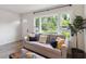 Cozy living room with large windows offering abundant natural light and comfortable seating at 286 Booker Sw St, Atlanta, GA 30315