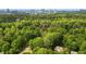 Lush treetops surround this home, offering both seclusion and proximity to the city skyline at 4910 Conover Dr, Atlanta, GA 30338