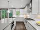 Modern kitchen with stainless steel appliances, island seating, and ample countertop space at 4910 Conover Dr, Atlanta, GA 30338