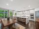 Eat-in kitchen featuring stainless steel appliances, a center island, and lots of natural light at 4910 Conover Dr, Atlanta, GA 30338