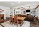 Spacious living room with hardwood floors, fireplace, and wooden ceiling beams at 4910 Conover Dr, Atlanta, GA 30338